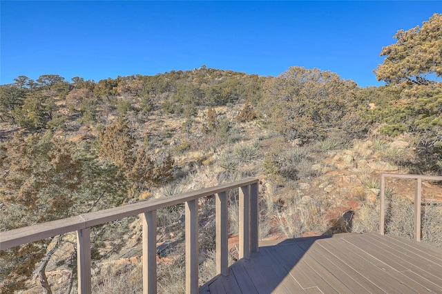 property view of mountains with a wooded view