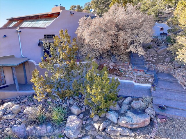 exterior space with stucco siding