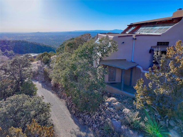 exterior space featuring a mountain view