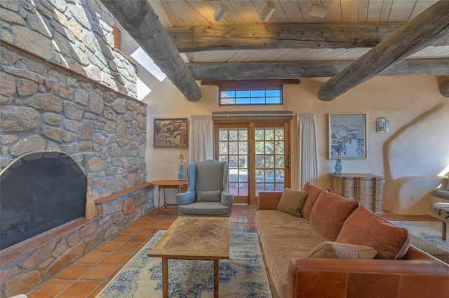 tiled living room featuring wooden ceiling and beam ceiling