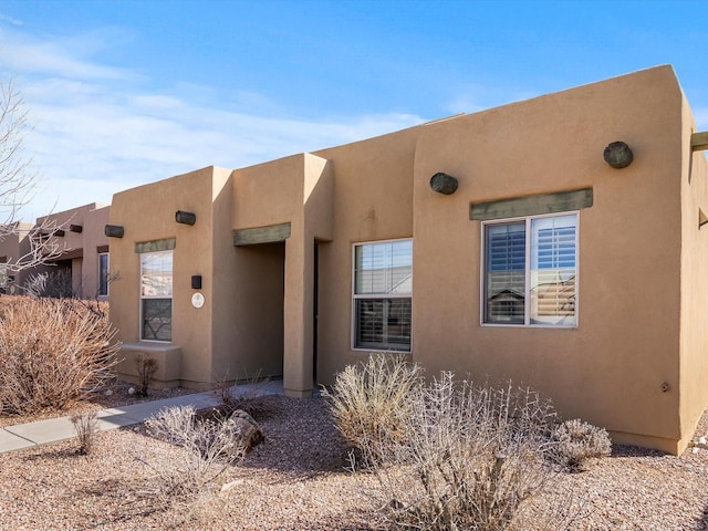 exterior space with stucco siding