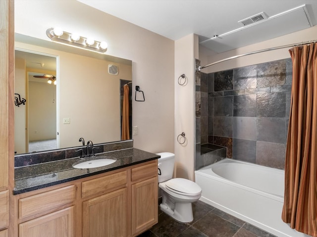 bathroom featuring visible vents, shower / bathtub combination with curtain, toilet, a ceiling fan, and vanity