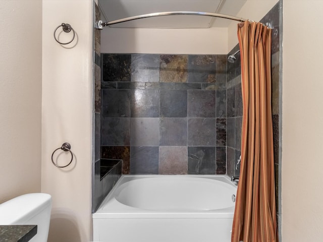 bathroom featuring toilet and shower / bathtub combination with curtain