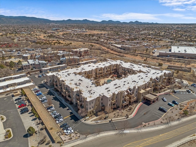 drone / aerial view featuring a mountain view