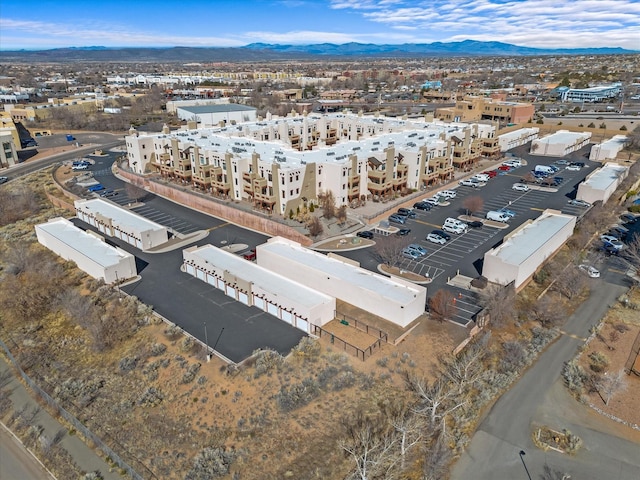 birds eye view of property featuring a mountain view