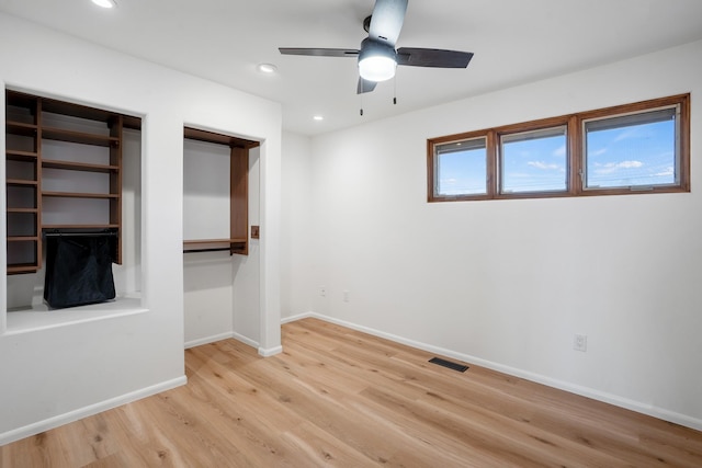 unfurnished bedroom featuring visible vents, recessed lighting, light wood-type flooring, and baseboards