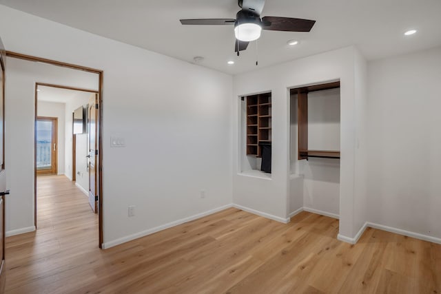 unfurnished bedroom with recessed lighting, baseboards, and light wood-style flooring