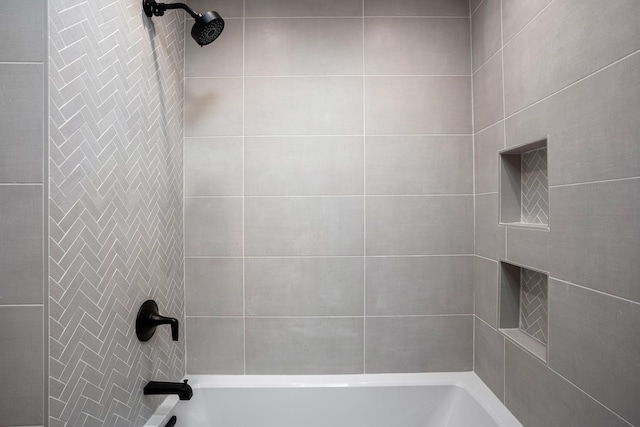 bathroom with shower / bathtub combination