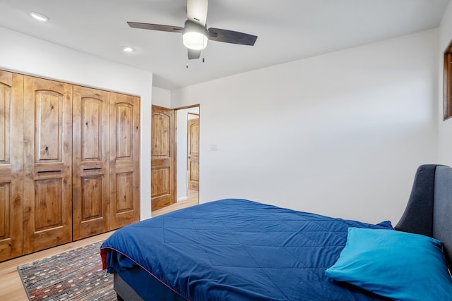 bedroom with recessed lighting, light wood-style flooring, and a ceiling fan