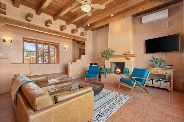 living room featuring visible vents, ceiling fan, an AC wall unit, wood ceiling, and beamed ceiling