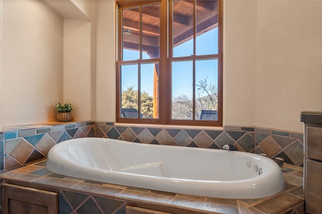 bathroom with a garden tub