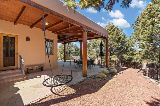 view of patio with fence