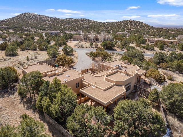 drone / aerial view featuring a mountain view