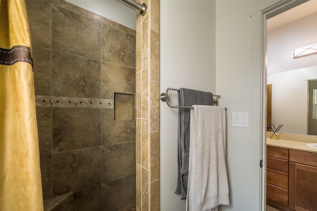 bathroom featuring vanity and walk in shower