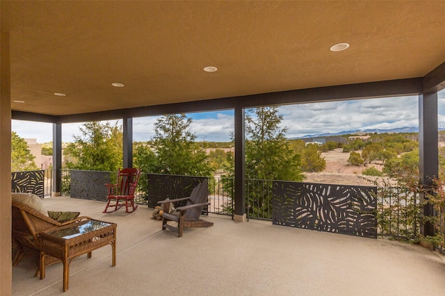 view of patio with a balcony