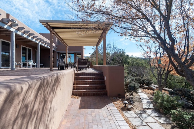 view of patio featuring a pergola