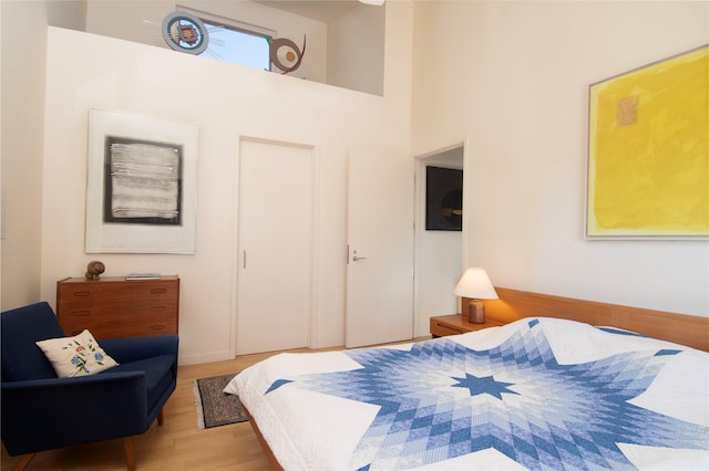 bedroom with wood finished floors