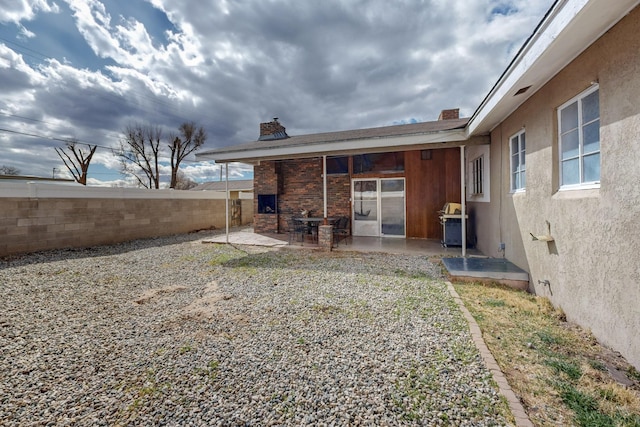 view of yard featuring a patio area and fence