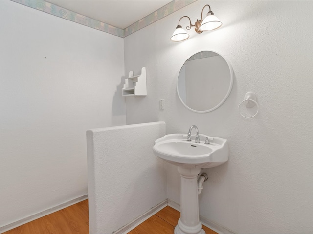 902 Calle Loma, Espanola, NM 87532 - bathroom with wood finished floors and baseboards