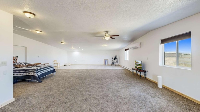 interior space with baseboards, a wall mounted air conditioner, and a textured ceiling