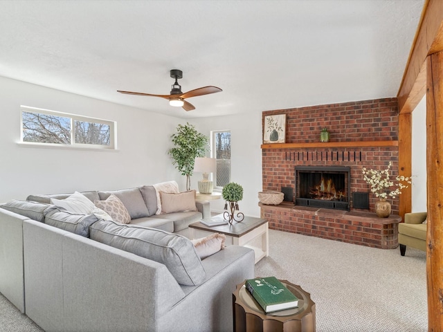 2606 Alamosa Dr, Santa Fe, NM 87505 - living room with carpet floors, a fireplace, and a ceiling fan