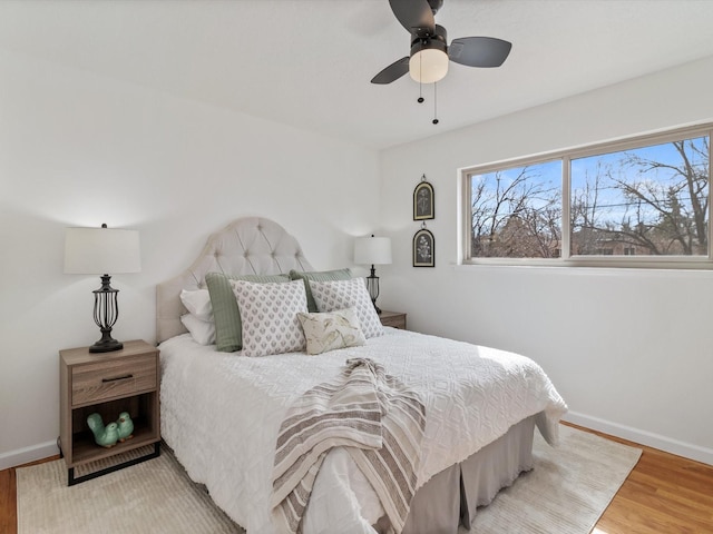 2606 Alamosa Dr, Santa Fe, NM 87505 - bedroom featuring a ceiling fan, light wood-style flooring, and baseboards