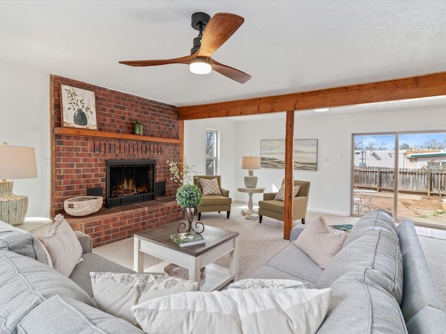 2606 Alamosa Dr, Santa Fe, NM 87505 - living area with carpet flooring, a ceiling fan, baseboards, and a fireplace
