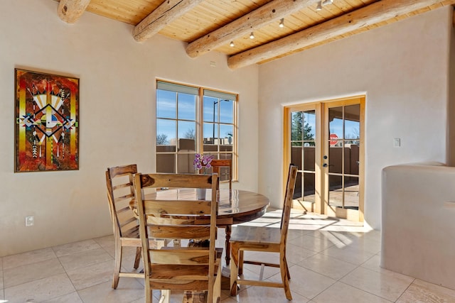 23 Camino Botanica, Santa Fe, NM 87507 - dining area featuring french doors, wood ceiling, beamed ceiling, and light tile patterned flooring