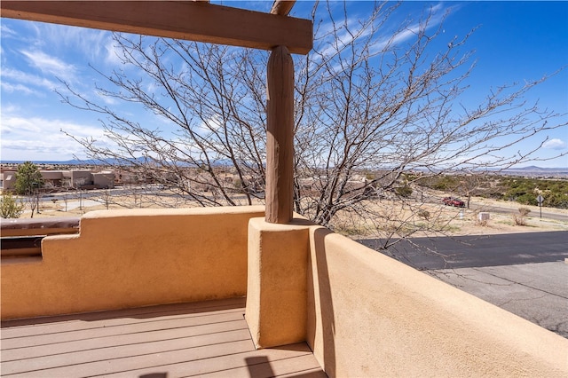 9 E Saddleback Mesa, Santa Fe, NM 87508 - wooden deck with a mountain view