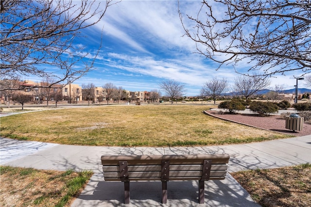 9 E Saddleback Mesa, Santa Fe, NM 87508 - view of property's community with a lawn