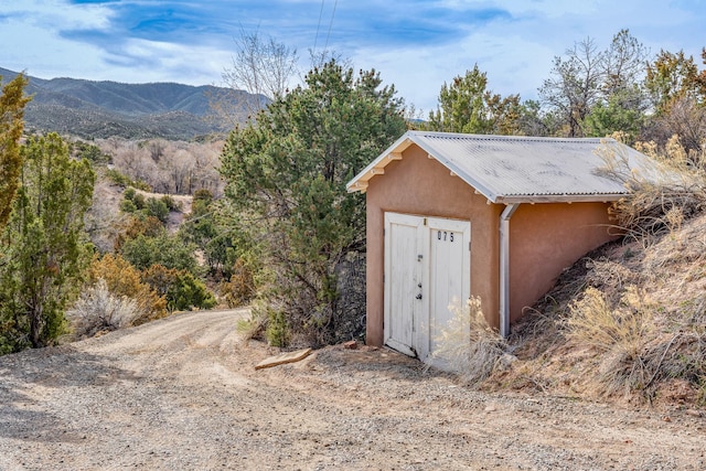 75A Camino Chupadero, Santa Fe, NM 87506 - view of shed featuring a mountain view