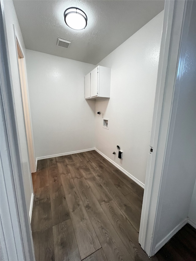 1666 Calle De Oriente Norte, Santa Fe, NM 87507 - washroom featuring washer hookup, a textured ceiling, dark wood-style floors, visible vents, and gas dryer hookup