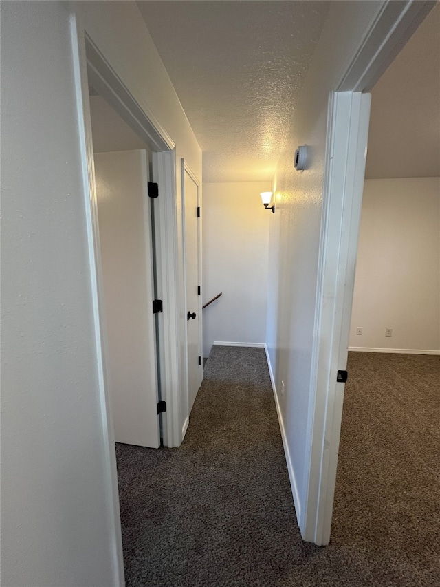 1666 Calle De Oriente Norte, Santa Fe, NM 87507 - corridor with baseboards, carpet flooring, and a textured ceiling