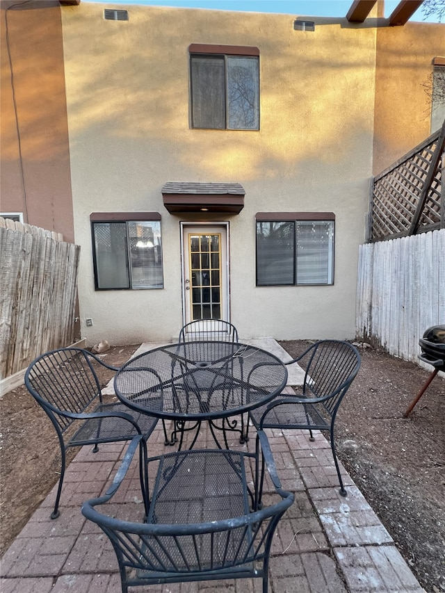 1666 Calle De Oriente Norte, Santa Fe, NM 87507 - exterior space with fence and outdoor dining area