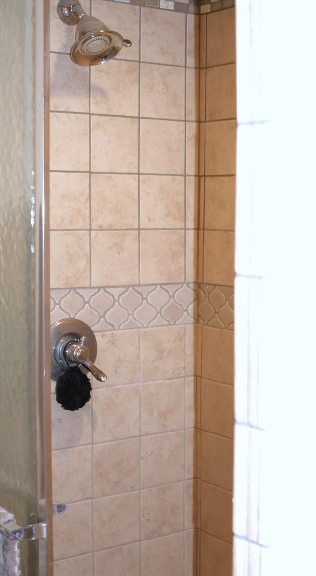 room details featuring a shower stall