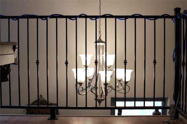 room details with a gate and a notable chandelier
