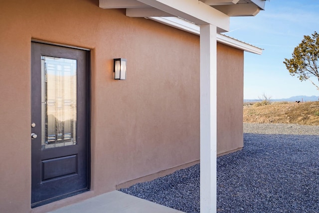 3 Cerro Cir, Lamy, NM 87540 - property entrance with stucco siding