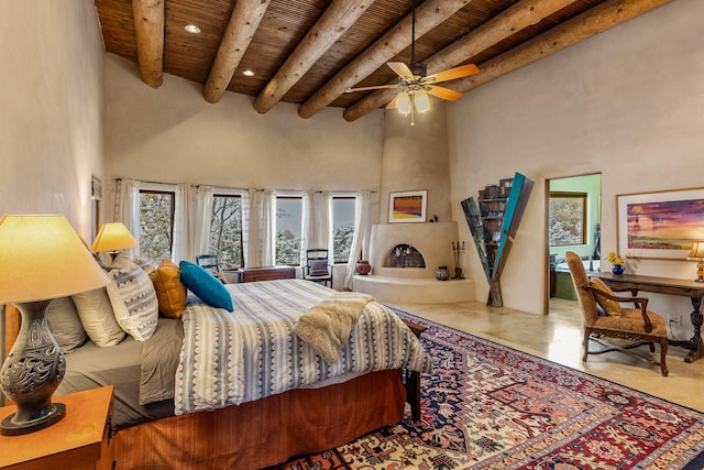 bedroom featuring recessed lighting, a high ceiling, wood ceiling, beam ceiling, and ceiling fan