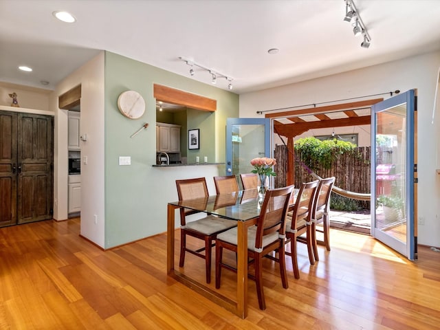 936 Dunlap, Santa Fe, NM 87501 - dining area featuring rail lighting, light wood finished floors, and recessed lighting