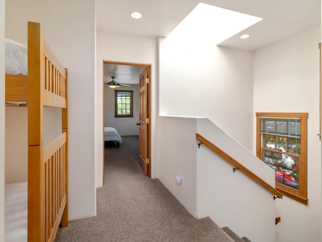936 Dunlap, Santa Fe, NM 87501 - hallway with an upstairs landing, carpet, recessed lighting, and a skylight