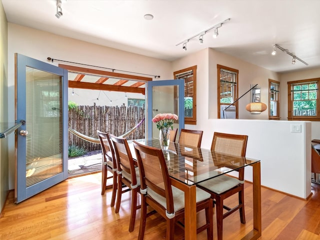 936 Dunlap, Santa Fe, NM 87501 - dining room with track lighting and light wood-style flooring