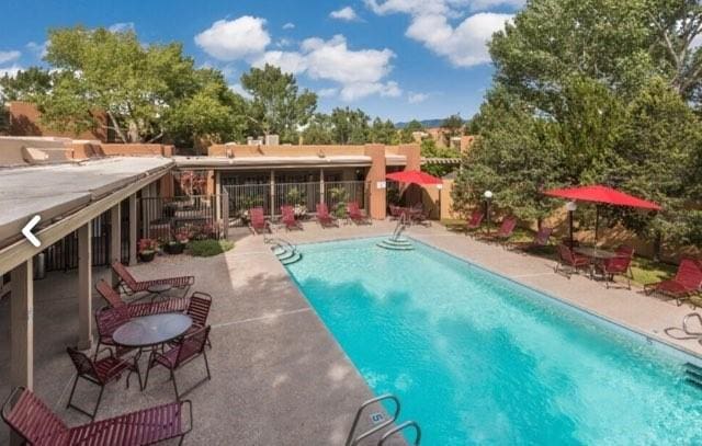 941 Calle Mejia Unit 207, Santa Fe, NM 87501 - community pool with a patio