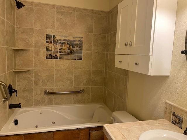 941 Calle Mejia Unit 207, Santa Fe, NM 87501 - bathroom featuring vanity and a combined bath / shower with jetted tub