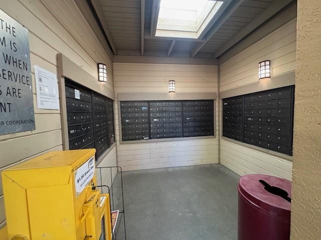 941 Calle Mejia Unit 207, Santa Fe, NM 87501 - view of home's community featuring mail area and wood walls