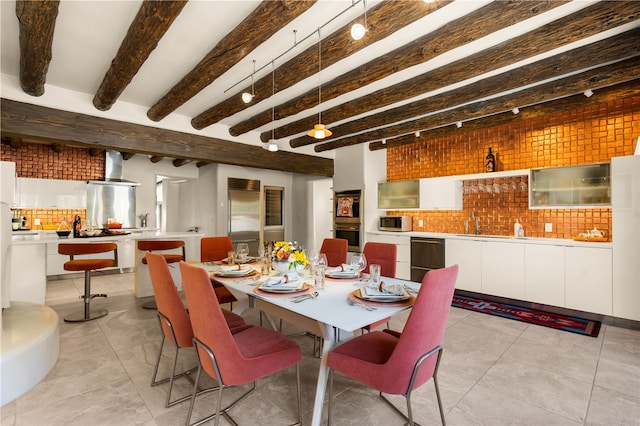 6 Overlook Rd, Santa Fe, NM 87505 - dining space featuring light tile patterned flooring and beam ceiling