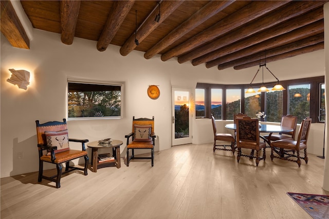 6 Overlook Rd, Santa Fe, NM 87505 - dining space with beam ceiling, wood ceiling, an inviting chandelier, hardwood / wood-style floors, and a healthy amount of sunlight