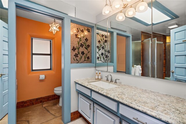 6 Overlook Rd, Santa Fe, NM 87505 - full bath with a stall shower, baseboards, toilet, and vanity