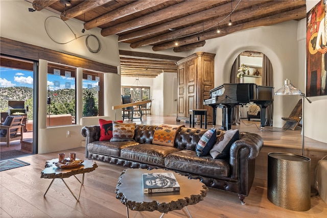 6 Overlook Rd, Santa Fe, NM 87505 - living room featuring beamed ceiling, wooden ceiling, and hardwood / wood-style flooring