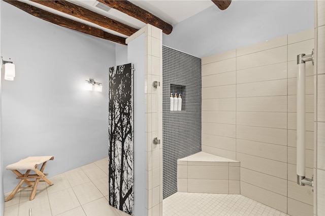 6 Overlook Rd, Santa Fe, NM 87505 - bathroom featuring visible vents, tiled shower, beam ceiling, and tile patterned flooring