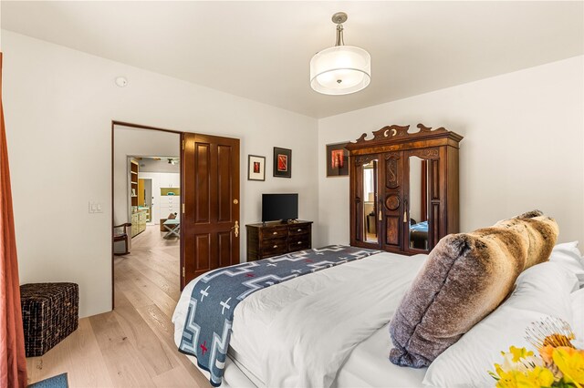 6 Overlook Rd, Santa Fe, NM 87505 - bedroom with light wood-type flooring